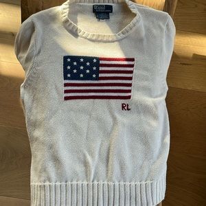 RL American flag sweater- I am a size small and fits like a medium on me.